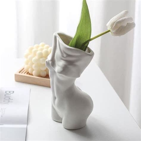 Naked woman vase